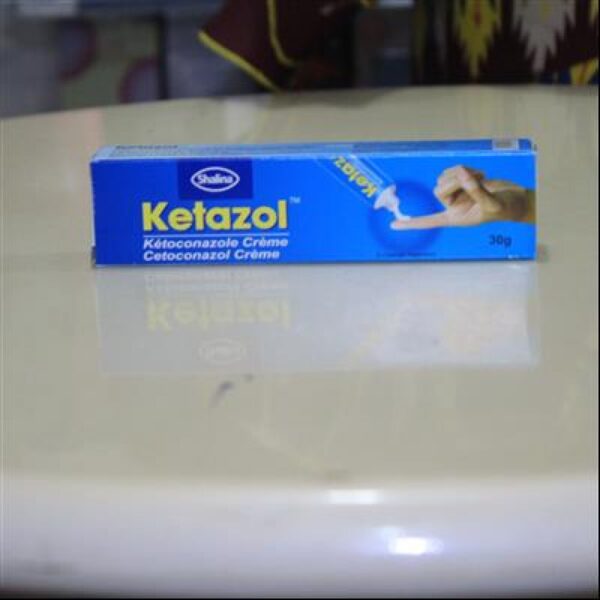 Ketoconazole is used to treat skin infections such as athlete's foot, jock itch, ringworm, and certain kinds of dandruff. This medication is also used to treat a skin condition known as pityriasis (tinea versicolor), a fungal infection that causes a lightening or darkening of the skin of the neck, chest, arms, or legs. Ketoconazole is an azole antifungal that works by preventing the growth of fungus.